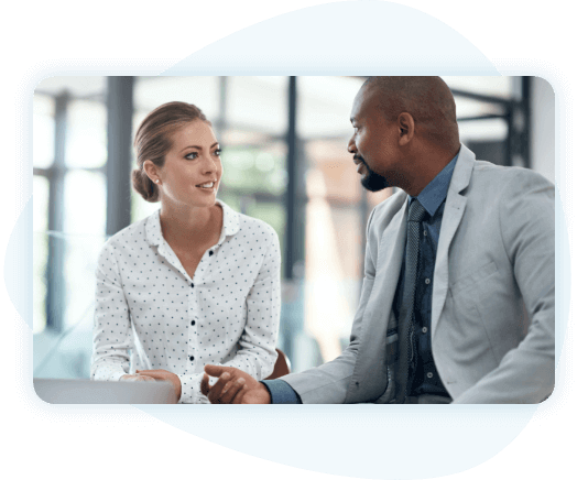 Woman talking to an insurance agent in a office setting